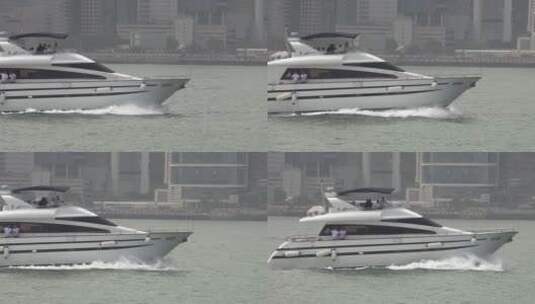 一艘游艇在香港海域快速驶过高清在线视频素材下载