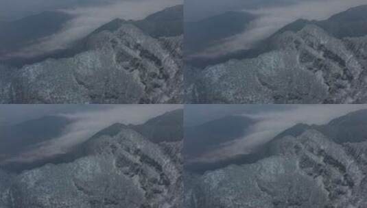 航拍峨眉山山顶悬崖雪景高清在线视频素材下载