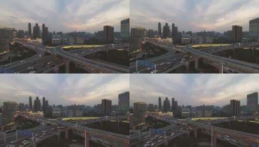 航拍城市黄昏高架桥拥堵的交通车流高清在线视频素材下载