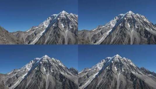 川西蓝天下的雅拉雪山高清在线视频素材下载