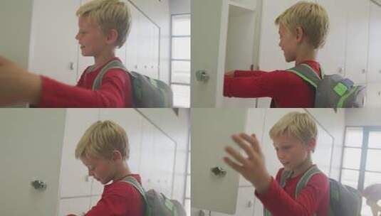 男孩在学校关闭储物柜和微笑的视频高清在线视频素材下载