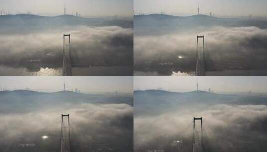 土耳其伊斯坦布尔雾天博斯普鲁斯桥的航拍视频。7月15日烈士桥06高清在线视频素材下载
