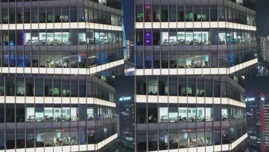 夜晚办公楼玻璃幕墙航拍高清在线视频素材下载