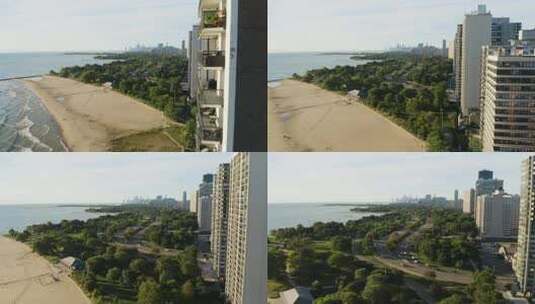 无人机靠近高层公寓，后面有海滩、湖岸大道和芝加哥天际线高清在线视频素材下载