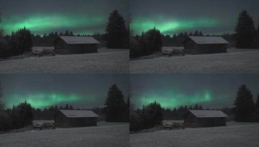 森林小屋上空的北极光4K高清在线视频素材下载