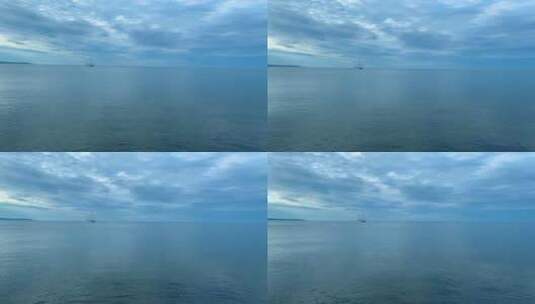 波罗的海波罗的海平静的海面上孤独的船，小波浪和清澈的蓝色海水高清在线视频素材下载
