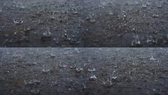 暴雨下雨雨滴落在地面上溅起水花高清在线视频素材下载