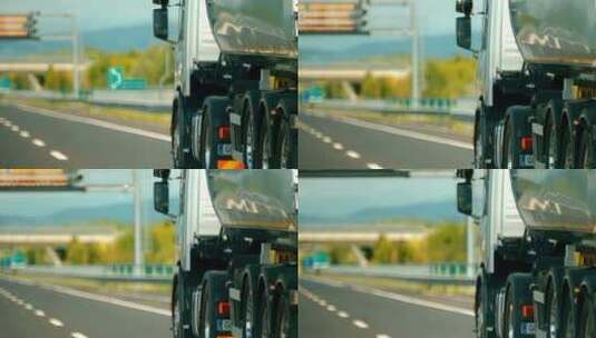 运输卡车在高速路上疾驰高清在线视频素材下载