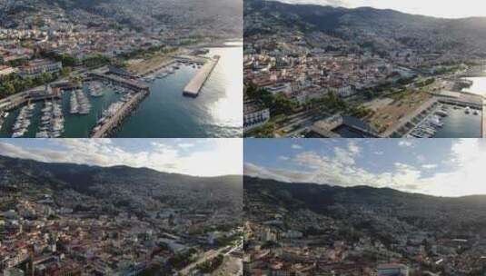 飞越葡萄牙马德拉岛的丰沙尔码头和普拉普多波沃高清在线视频素材下载