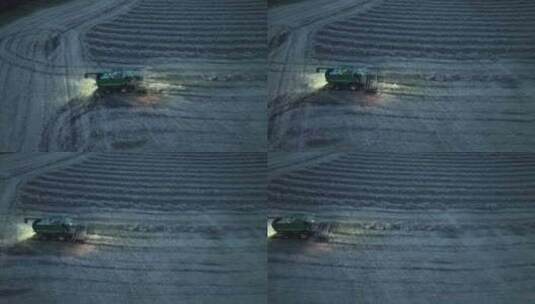 航拍内蒙古呼伦贝尔市农场上机械作业高清在线视频素材下载