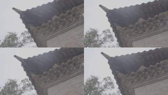 云南石屏文庙墙角瓦房顶流下雨水高清在线视频素材下载