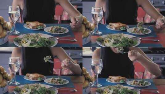 女子用刀叉吃沙拉高清在线视频素材下载