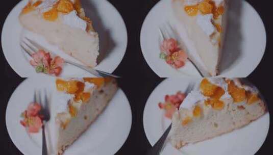 盘子上叉子旁边的一片用糖粉装饰的水果蛋糕高清在线视频素材下载