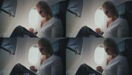女人在飞机驾驶舱阅读杂志高清在线视频素材下载