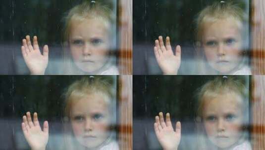 小女孩在窗前伤心高清在线视频素材下载