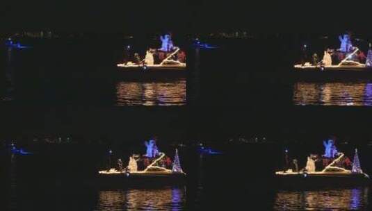夜幕下圣诞游行的船只高清在线视频素材下载