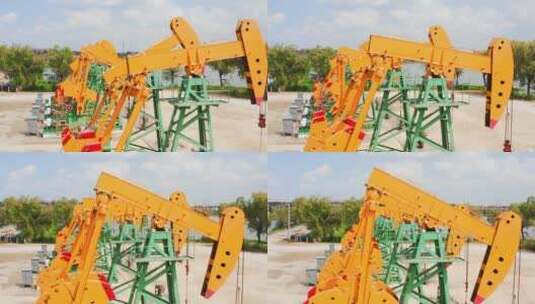 大庆油田运转中的磕头机抽油机高清在线视频素材下载