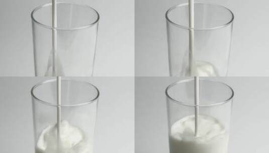 把牛奶倒进玻璃杯里高清在线视频素材下载