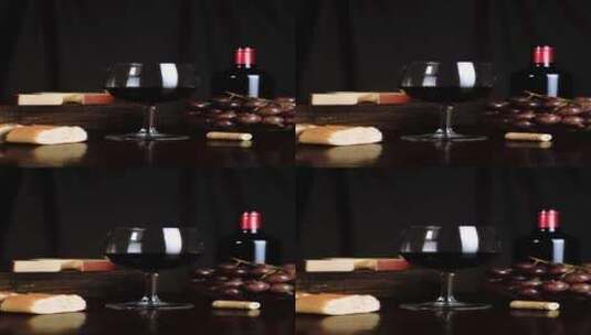 桌子上有葡萄酒_奶酪_葡萄和面包的图像构图高清在线视频素材下载