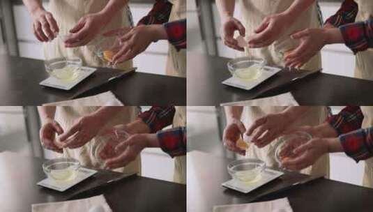 男人和女人将蛋清从蛋黄中分离到碗里高清在线视频素材下载