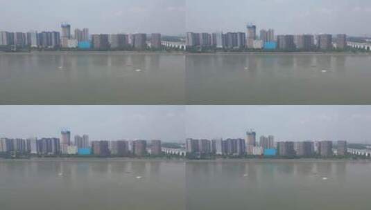 城市航拍宜昌长江边高楼建筑CBD高清在线视频素材下载