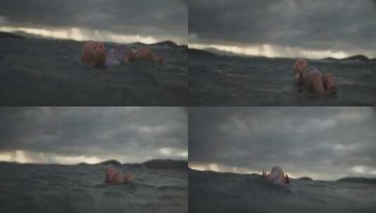 海面上漂浮的玩偶娃娃特写高清在线视频素材下载