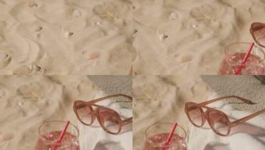 沙滩上的太阳镜和度假装备特写 高清在线视频素材下载