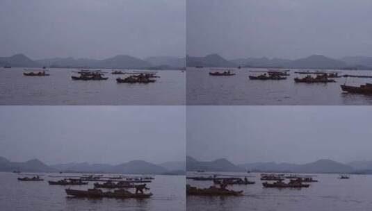 在雨中依旧行驶的小舟们高清在线视频素材下载