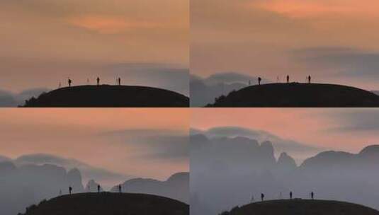 广西山顶人物攀登登顶航拍喀斯特地貌高清在线视频素材下载