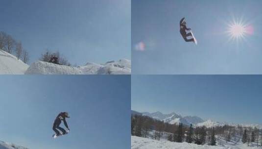 滑雪者在阳光明媚的冬日跳跃高清在线视频素材下载