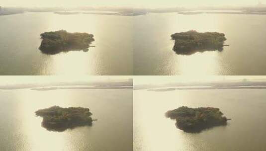 实拍唯美湖中小岛生态波光粼粼的湖面高清在线视频素材下载
