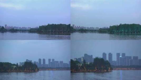 武汉东湖地拍傍晚湖边沿岸树木建筑高清在线视频素材下载