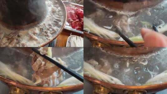 铜锅涮锅沸腾俯瞰涮肉夹肉慢动作一组2高清在线视频素材下载