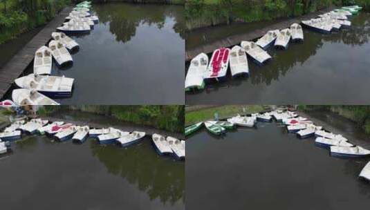 停泊在湖边码头旁的踏板船高清在线视频素材下载