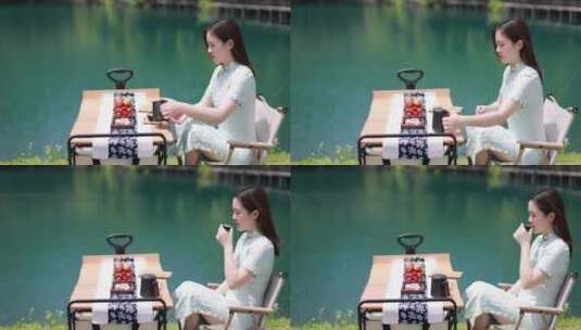 坐在湖边喝茶的美女 喝茶 茶文化高清在线视频素材下载
