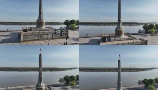 黑龙江佳木斯城市和防洪纪念塔航拍高清在线视频素材下载