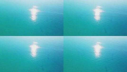 航拍海南三沙市西沙海洋蔚蓝色大海与游艇高清在线视频素材下载