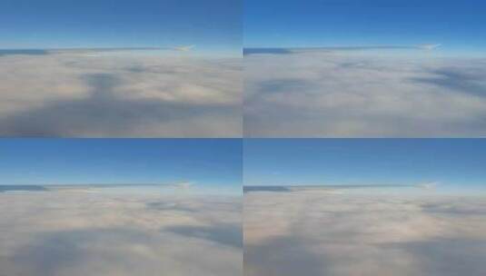 飞机舷窗航拍万米高空蓝天白云高清在线视频素材下载