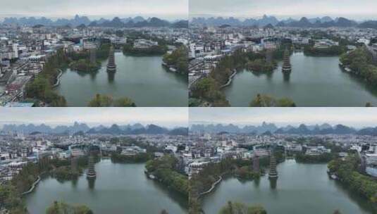 航拍广西省桂林市日月双塔文化公园城市风光高清在线视频素材下载