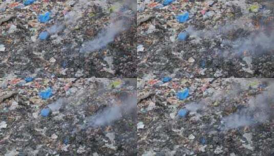 印度孟买达鲁瓦伊贫民窟焚烧垃圾填埋场高清在线视频素材下载