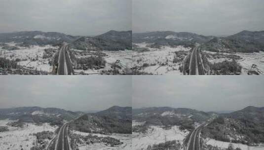 大山中的高速公路雪景航拍高清在线视频素材下载
