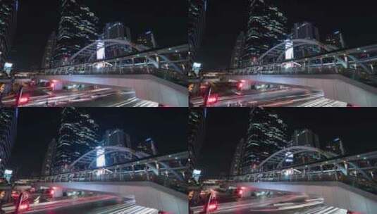 夜间在城市人行道下行驶的汽车延时行驶高清在线视频素材下载