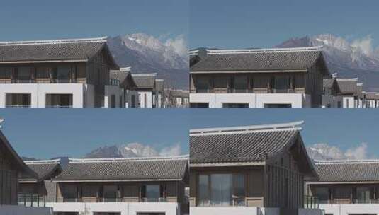 航拍雪山脚下的房屋建筑高清在线视频素材下载