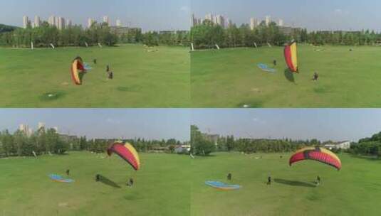 武汉滑翔伞基地航拍起飞绿地楼房709高清在线视频素材下载