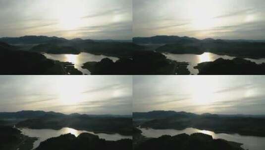 夕阳下的湖面河流竹林山航拍高清在线视频素材下载