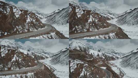 西藏旅游风光317国道蜿蜒公路雪山高清在线视频素材下载