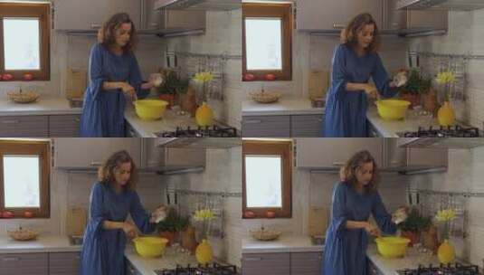 厨房搅拌面粉和面的女人高清在线视频素材下载