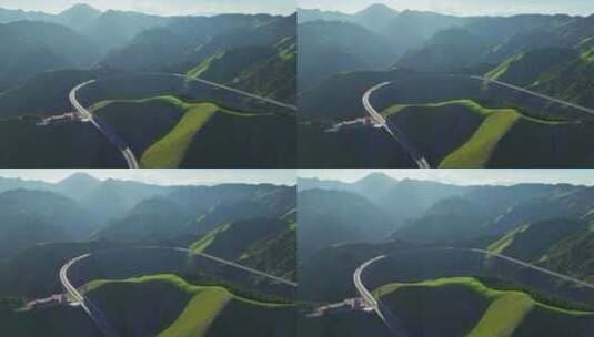 航拍新疆山谷中的公路高架桥高清在线视频素材下载