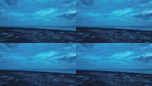 夜晚海边沙滩风景阴天大海礁石海岸自然风光高清在线视频素材下载