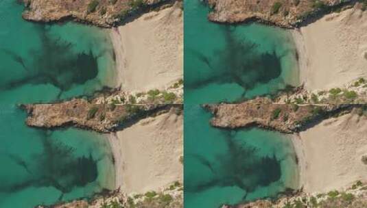 意大利西西里岛Vendicari绿洲中Calamosche的绿松石海和空沙滩高清在线视频素材下载